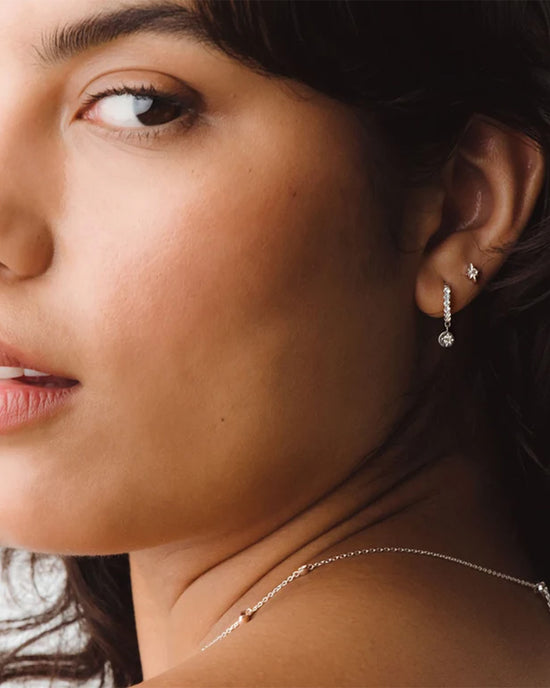 Silver Polaris White Sapphire Huggie Earrings