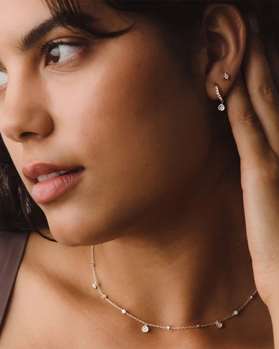 Silver Polaris White Sapphire Huggie Earrings