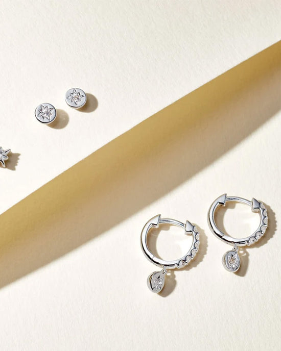 Silver Polaris White Sapphire Huggie Earrings