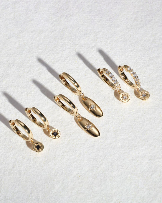 Gold Polaris White Sapphire Huggie Earrings