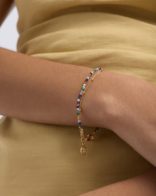Gold fine biography multi gemstone compass bracelet