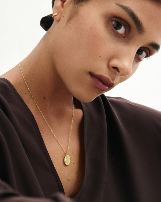 Gold Tiny Star Oval Locket Necklace
