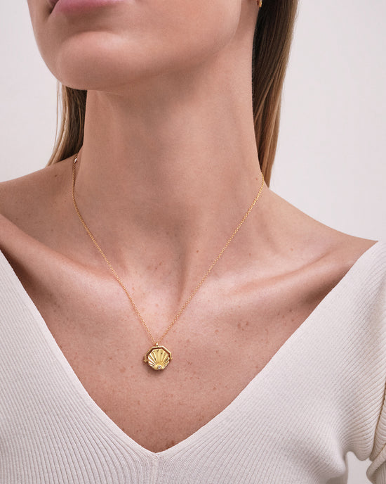 Gold Celestial Sunrise Spinner Locket Necklace