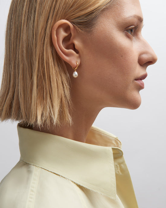 Gold Celestial Pearl Drop Huggie Earrings