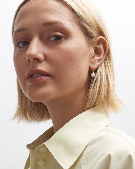 Gold Celestial Pearl Drop Huggie Earrings