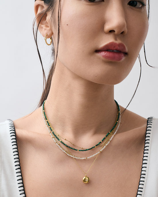 Gold Biography Mother of Pearl Necklace