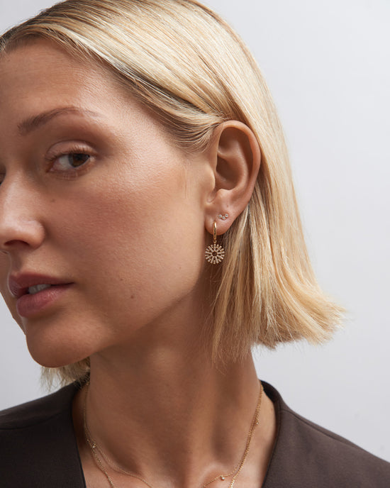 Solid Gold Rising Sun Huggie Earrings