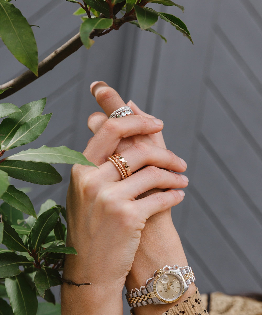 Model wearing Astley Clarke stackable rings in Silver and Rose Gold | The Astley Clarke Blog