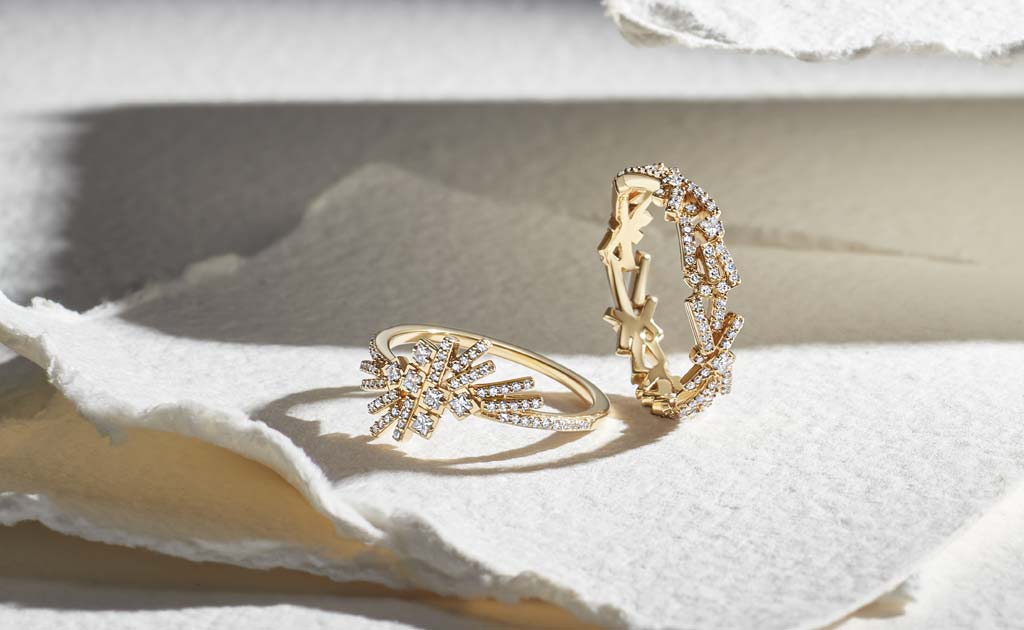 Comet 14 carat solid gold Flare diamond eternity ring and Comet 14 carat solid gold Flare diamond ring by British jewellery designer Astley Clarke