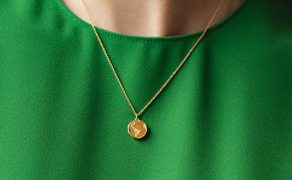 Model wearing Astley Clarke Earth Photo Locket Necklace in yellow gold vermeil | The Astley Clarke Blog