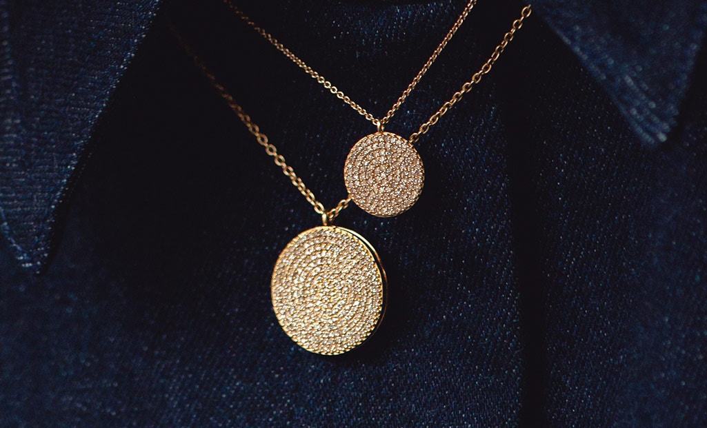 Model wearing Astley Clarke Icon Diamond Lockets in Solid 14ct Gold