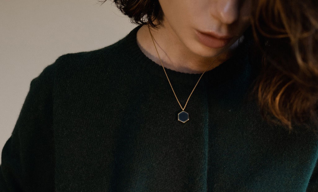 Lolita Mas wearing the Deco Black Spinel Slice Locket in 18ct yellow gold vermeil