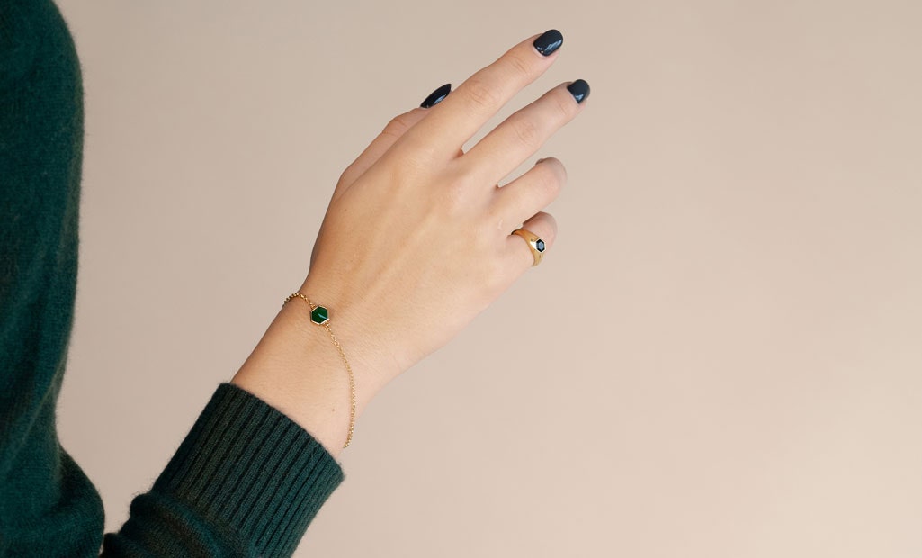 Lolita Mas wearing the Deco Green Agate Gemstone Bracelet and Mini Green Agate Gemstone Signet Ring in 18ct yellow gold vermeil