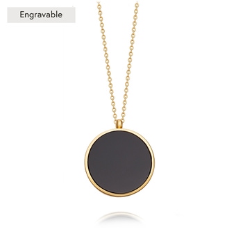 black onyx locket necklace with gold ring stack