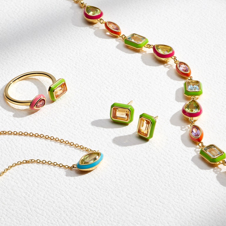 enamel jewellery with neon green earrings and multicoloured gemstone necklace