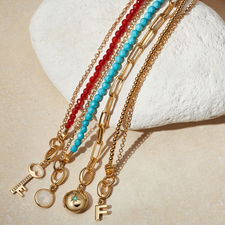 Gold Biography Red Agate Bracelet