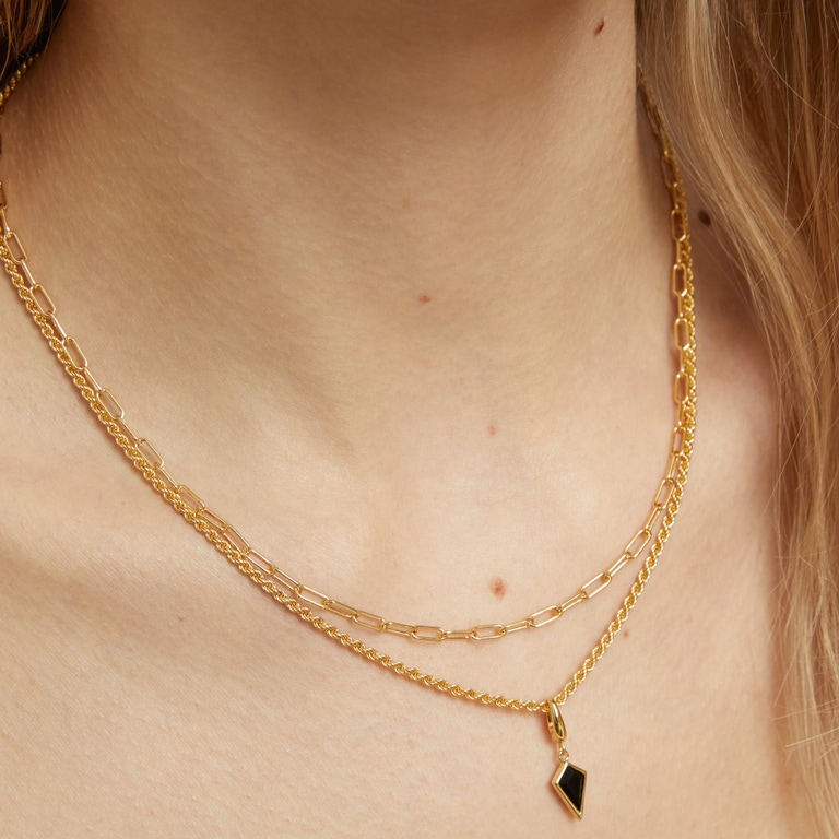 Gold Biography Black Onyx Kite Charm