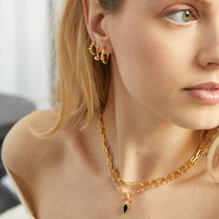 Gold Biography Black Onyx Kite Charm