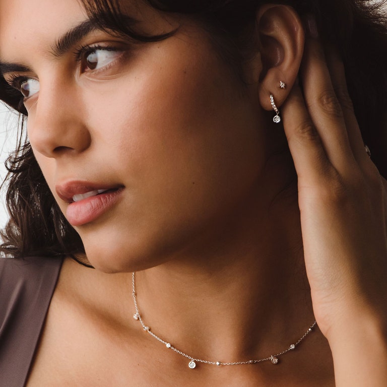 Silver Polaris White Sapphire Huggie Earrings
