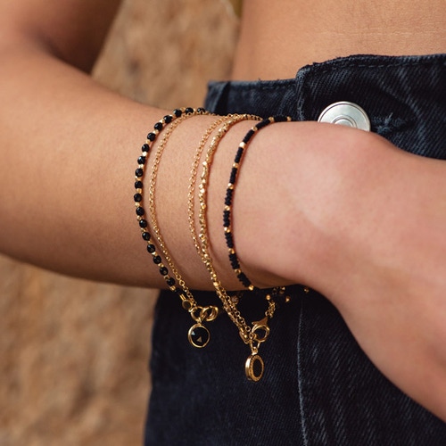 Gold Biography Black Onyx Charm Bracelet