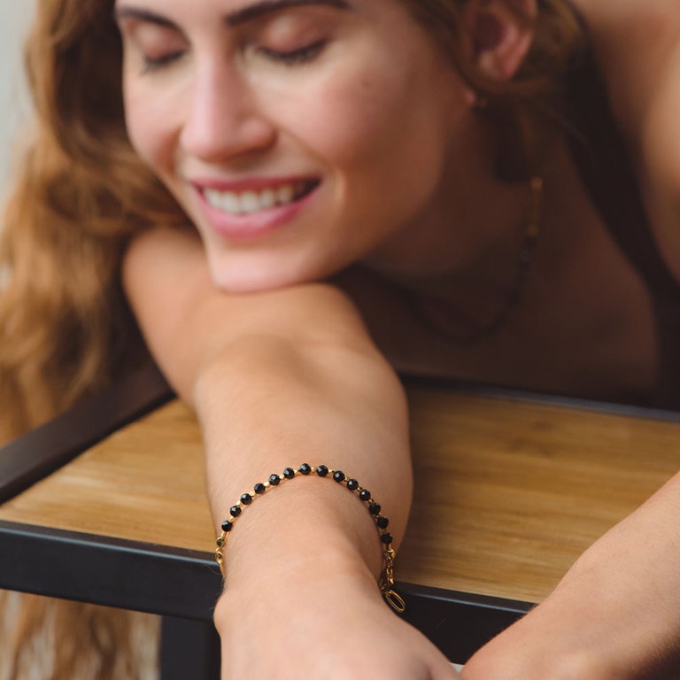 Orbit and Biography Black Spinel Star Set Bracelet in Yellow Gold Vermeil | Astley Clarke
