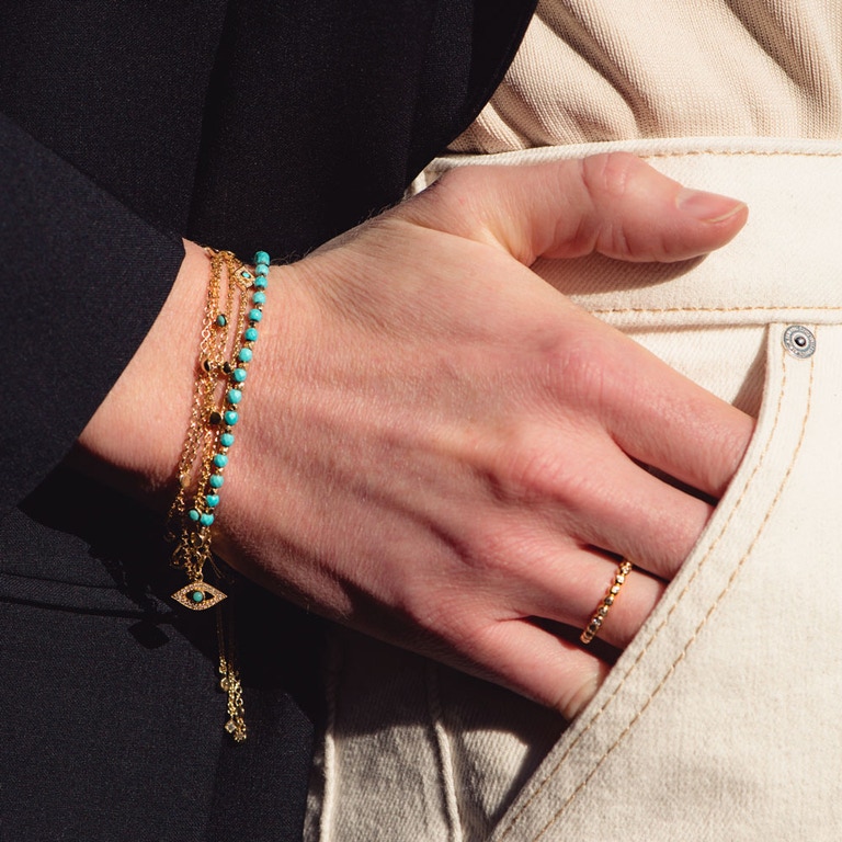 Gold Biography Adorned Turquoise Evil Eye Bracelet stack with gold ring