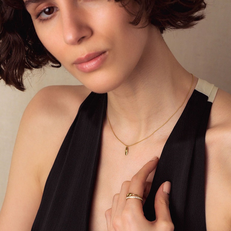 Gold Polaris Star Set Oval Pendant Necklace