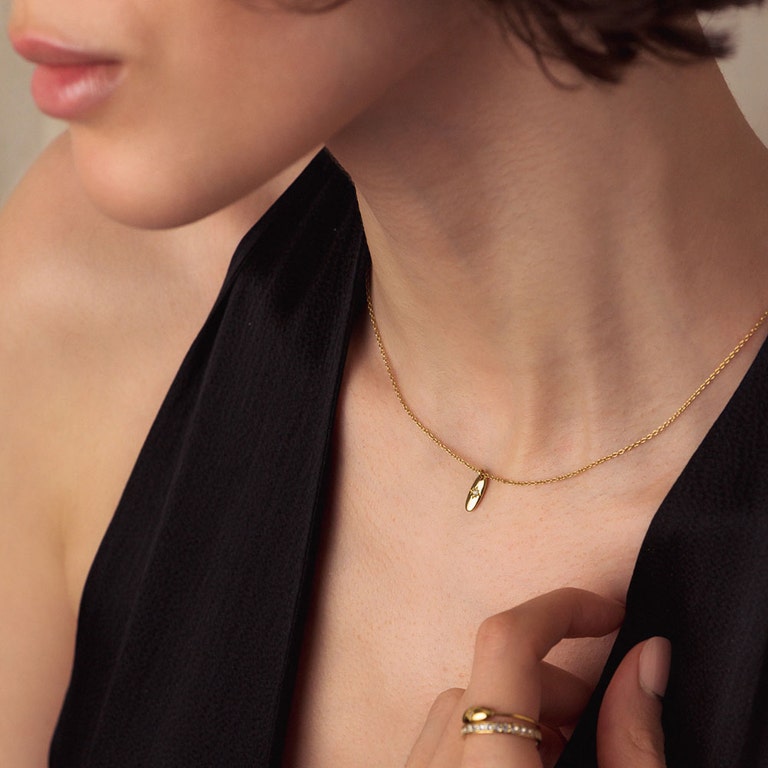Gold Polaris Star Set Oval Pendant Necklace