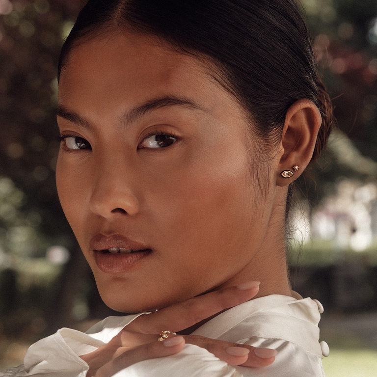 Gold Flare White Topaz Marquise Cut Stud Earring
