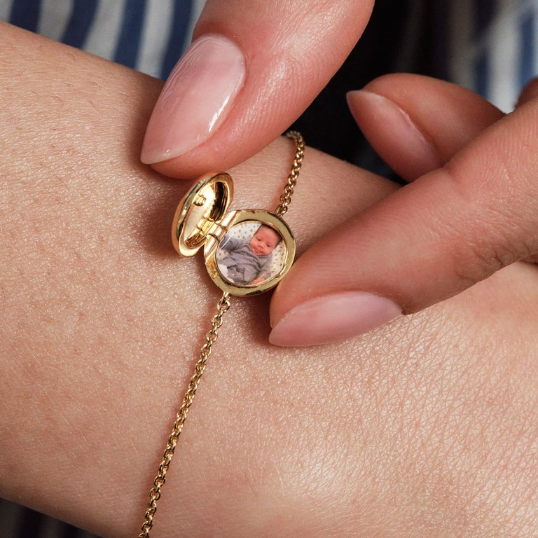 Gold locket bracelet with personalised image