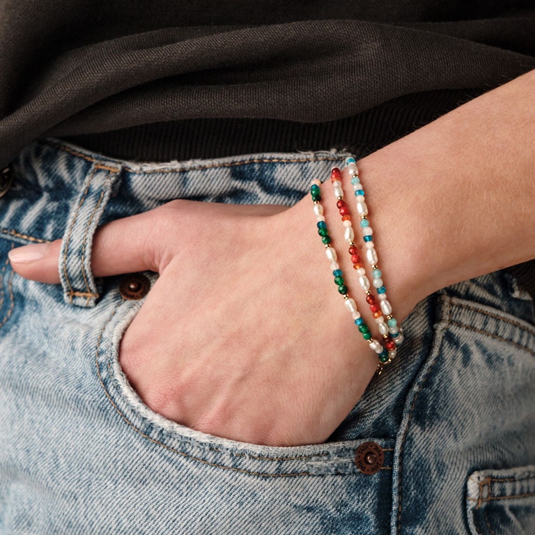pearl and gemstone bracelet stack in 18ct yellow gold vermeil with blue bracelet, red bracelet and green bracelet