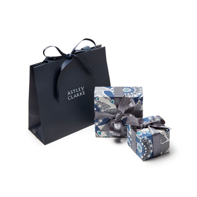 Astley Clarke gift wrap with blue paper