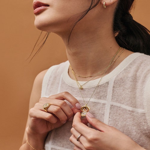 Gold Celstial Spinner Locket Necklace