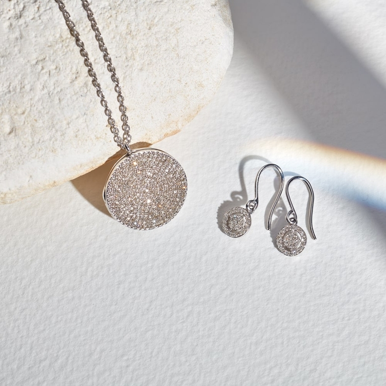 solid white gold locket necklace with diamond drop earrings