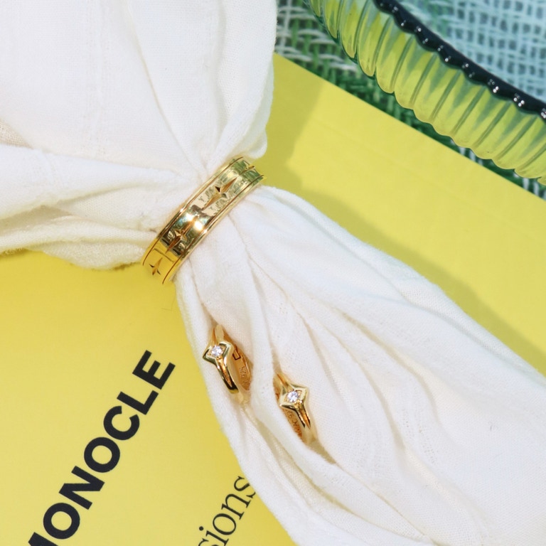Gold Luna Star Huggie Hoops | Astley Clarke