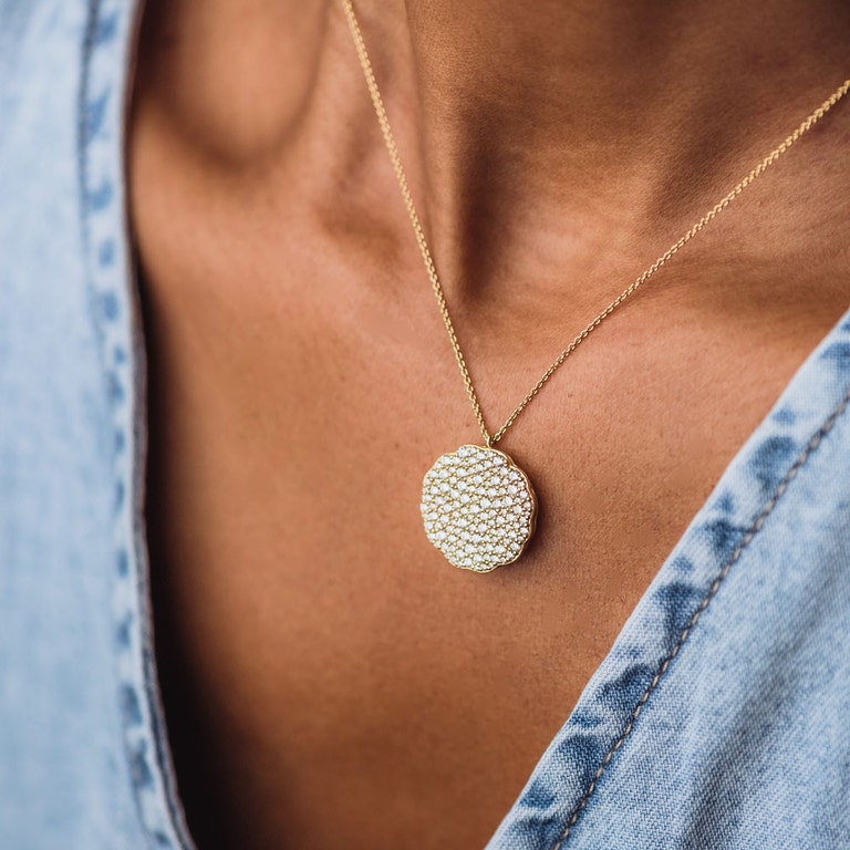 solid gold and diamond locket necklace