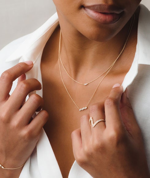 Still life of celestial jewellery pieces