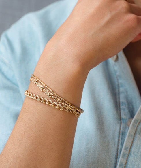 Still life of gold bracelets