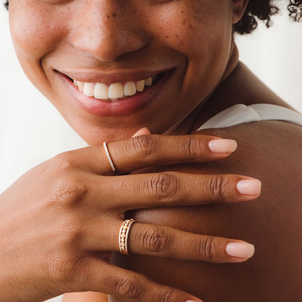 rose gold opal ring and rose gold diamond ring