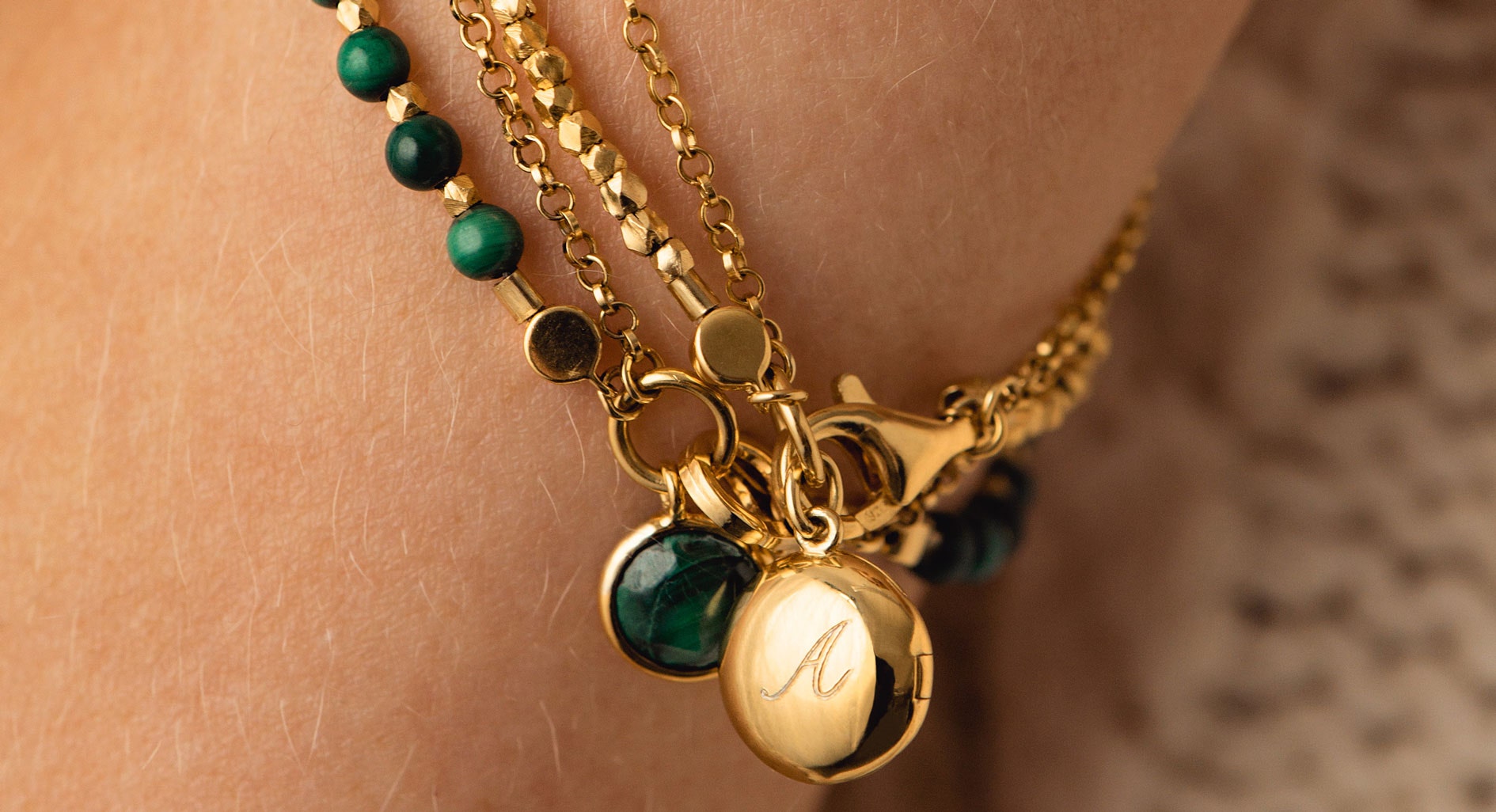 GOLD LOCKET BRACELET WITH MALACHITE CHARM BRACELET