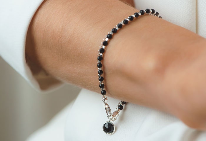 silver bracelet with black onyx gemstone charm