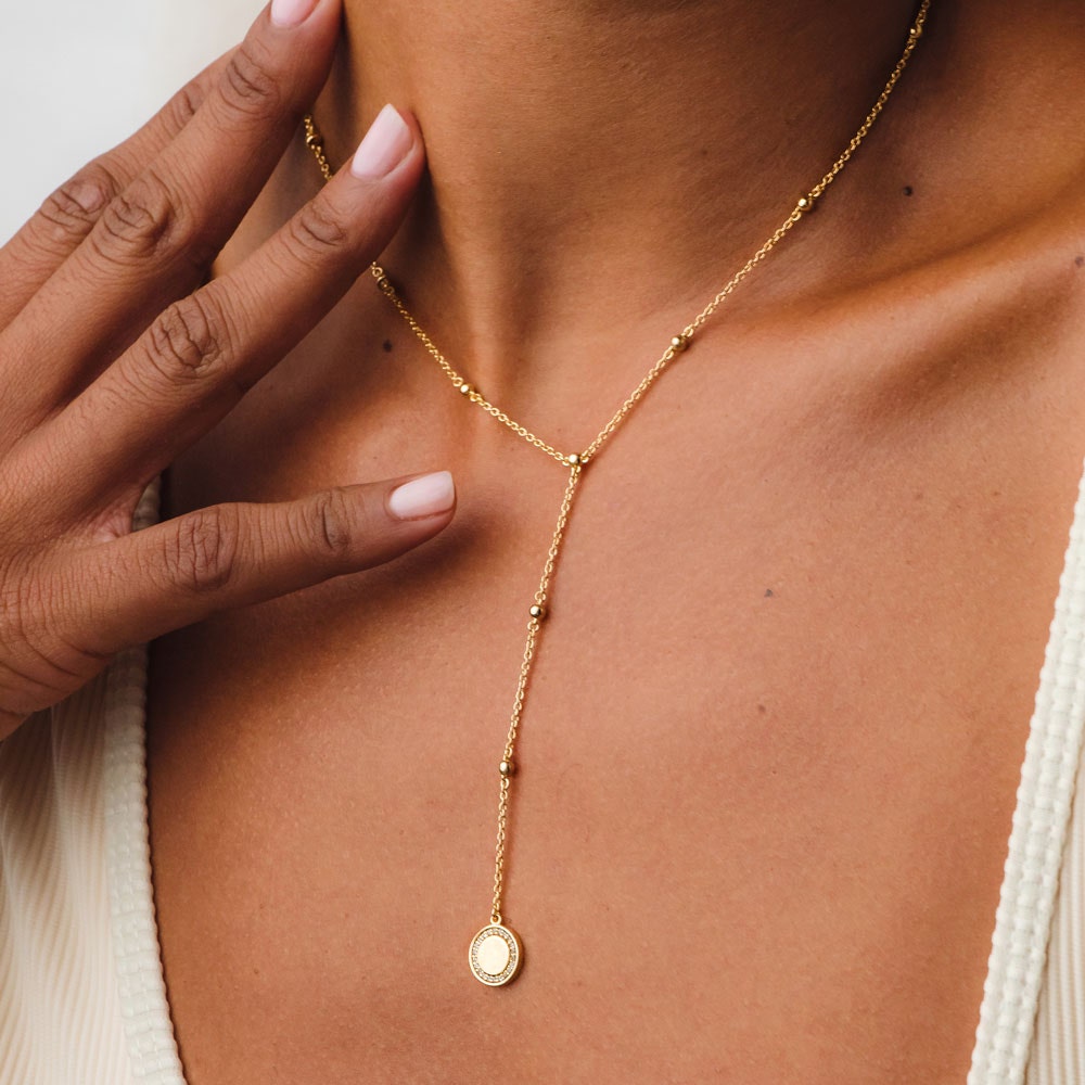 GOLD COSMOS LARIAT NECKLACE IN GOLD VERMEIL