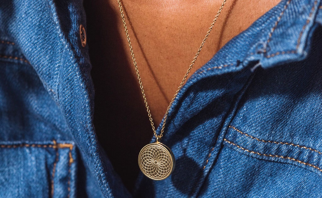 CELESTIAL RADIAL LOCKET NECKLACE IN YELLOW GOLD VERMEIL