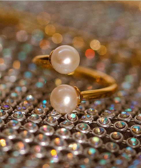 Still life of celestial jewellery pieces