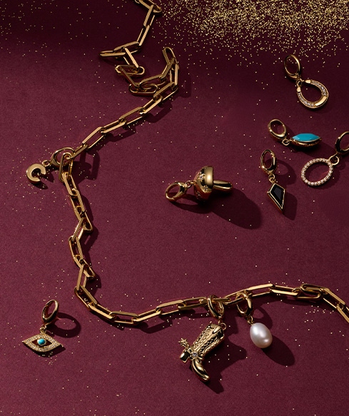 Still life of celestial jewellery pieces
