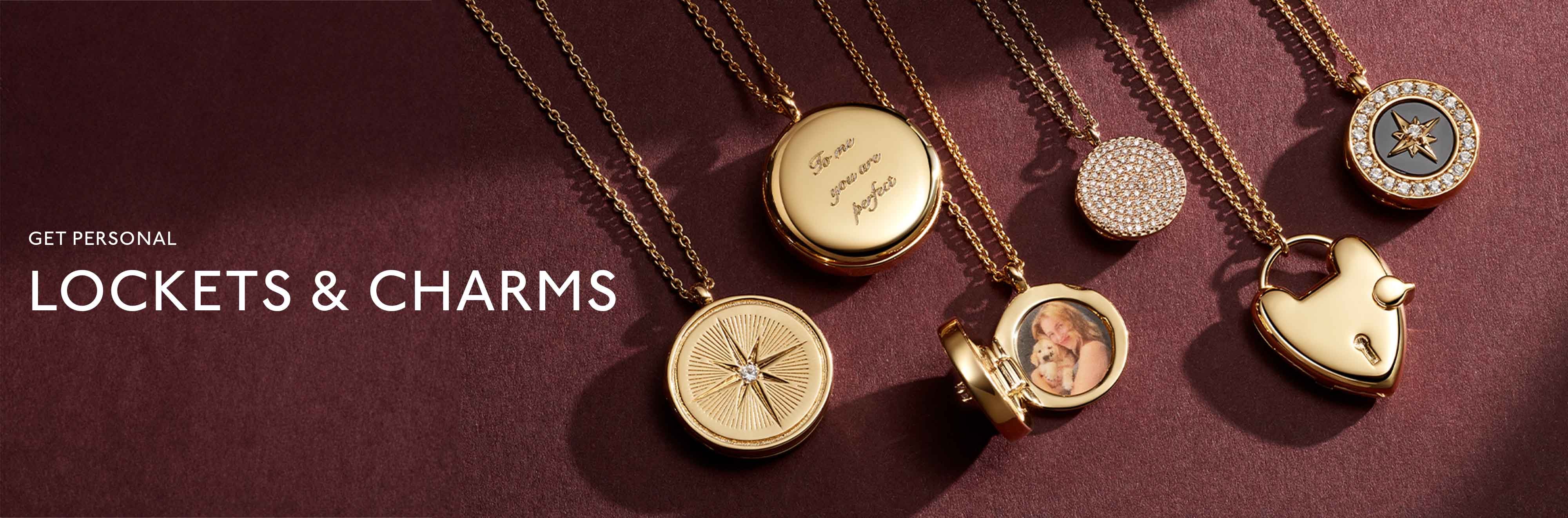 Gold jewellery stack with engraved locket