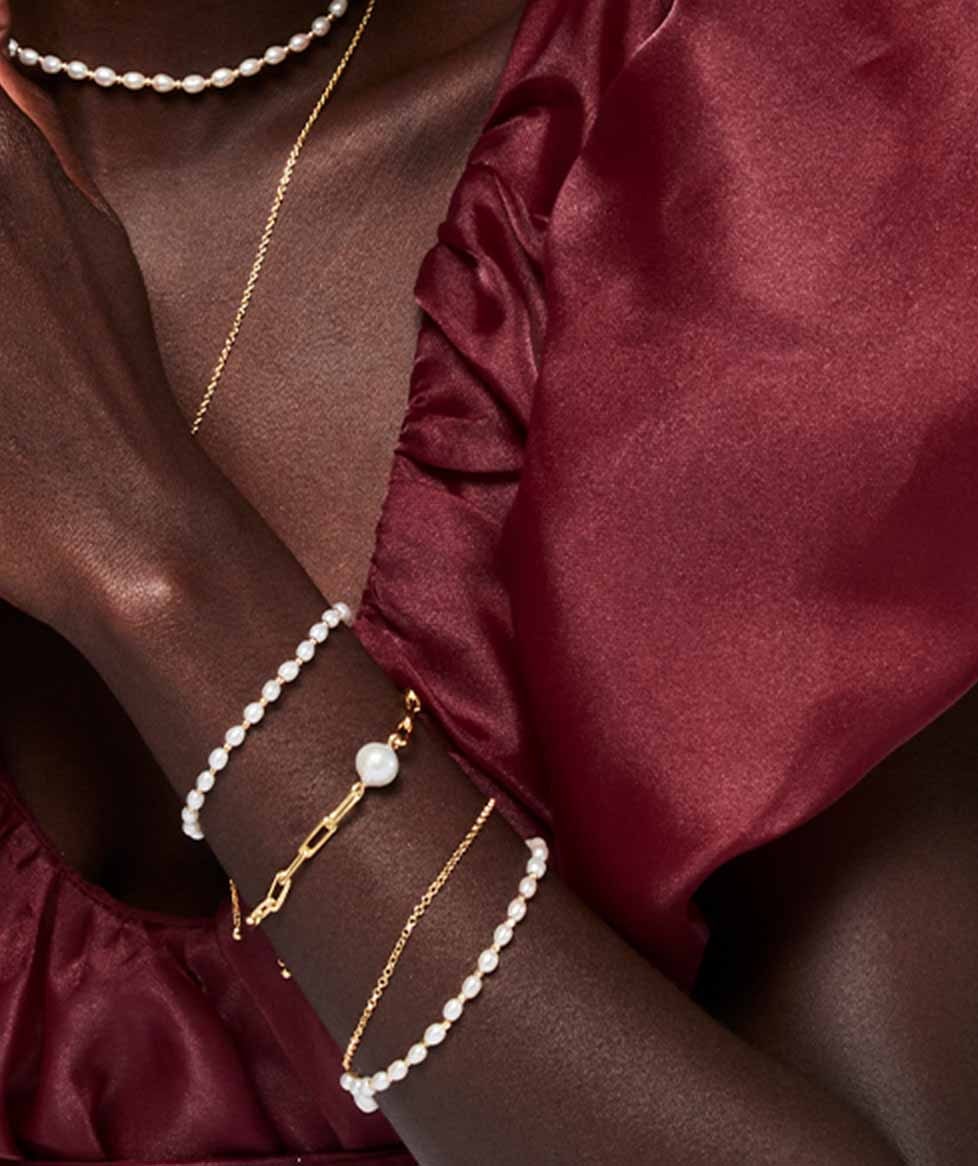 Still life of celestial jewellery pieces