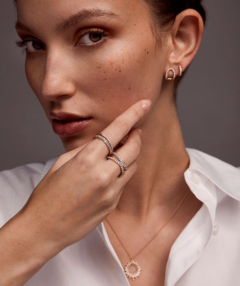 Still life of celestial jewellery pieces