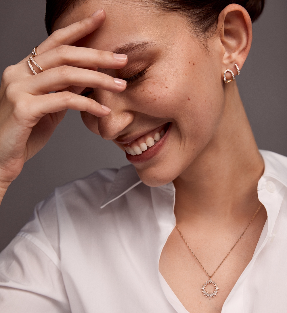 Necklace and bracelet stack with diamond earrings
