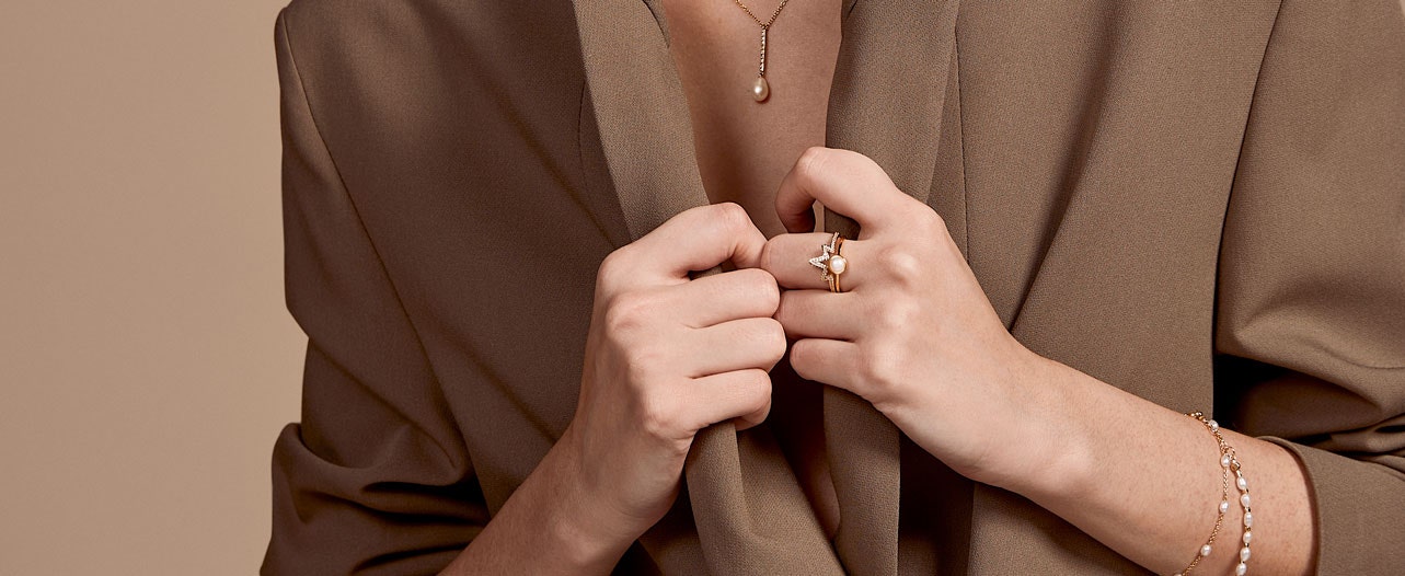 pearl jewellery stack with gold vermeil ring jacket and pearl ring